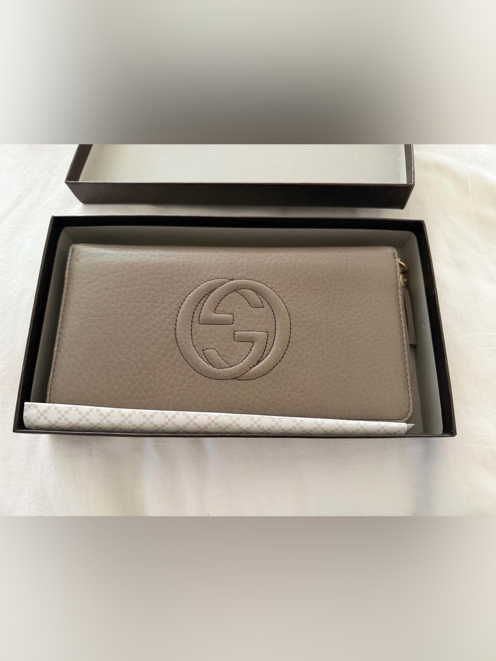 Gucci Taupe Embossed GG Zip-Around Wallet
